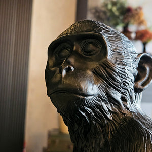 20" MONKEY WITH LIGHTBULB TABLE LAMP, BLACK